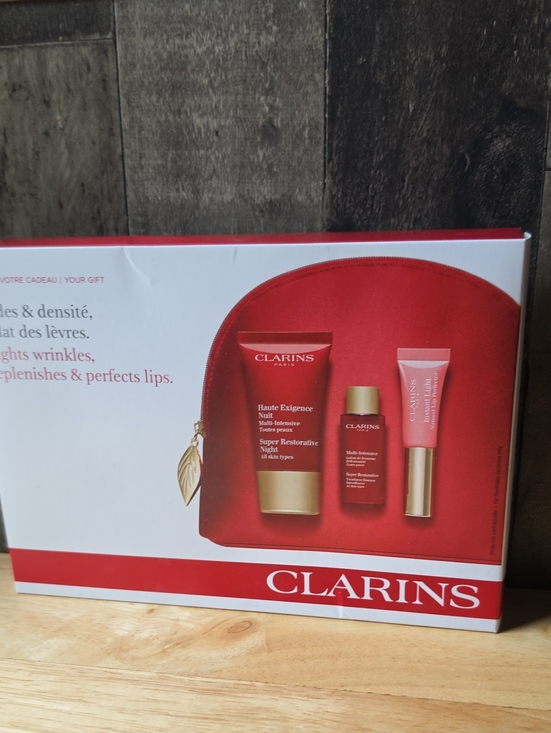 Clarins Other - Clarins Red Skincare Trio with Red Pouch